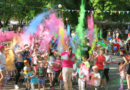 Piana, dmuchańce i moc atrakcji – Dzień Dziecka w Zawidowie! dzieci bawiące się w parku miejskim w kolorach holi.